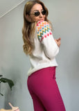 Knitted sweater for warm winter in colorful stripe